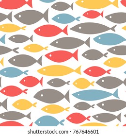 Small colorful fishes on white background. Abstract vector seamless pattern in flat style