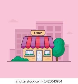 small cozy shop that stands out among the mass of gray skyscrapers