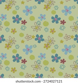 Small cute blue and green hand drawn seamless flowers on a light green background. Designed for fabric, fashion, textile, wallpaper, gift wrapping.