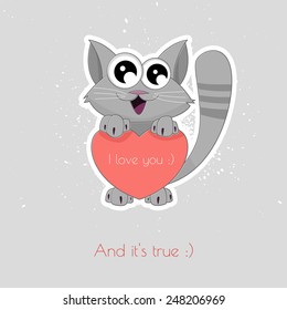Small cute kitten hugging a toy heart. Give love. Greeting card. Card for Valentine's Day. Birthday card.