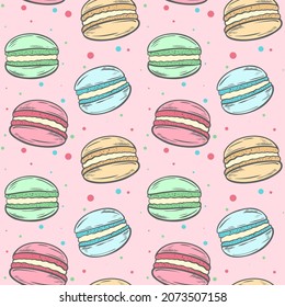 Small cute multi-colored cakes on a pink substrate with speckles seamless pattern. Background with macaroons. Template with food for packaging, wallpaper and design, vector illustration.