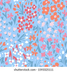 Small daisies and different meadow flowers, forbs and plants. Repeat botanical pattern. Hand drawn florals. Flat style illustration. Trendy fashion design for textile, fabric, surface and wrapping.