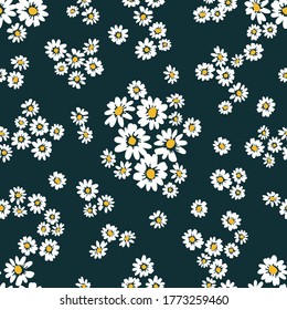 Small daisies on black background. Seamless pattern with cute flowers. Vintage textile collection. Template for dresses, scarves, wallpappers.