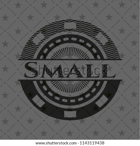 Small dark icon or emblem