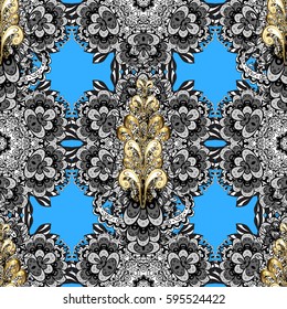 Small depth of field. Carving. Blue tree with gold trim. Seamless element woodcarving. Luxury furniture. Pattern on blue background with golden elements. Patina. Furniture in classic style.