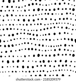 Small dots in a row seamless pattern. Neat rows of hand drawn uneven dots. Abstract black and white seamless pattern. Brush painted vector stains. Speckles or stains of different size texture