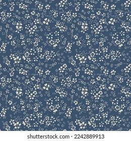 small flower seamless pattern on blue background