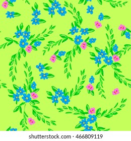Small flowers background. Cute meadow blossom flowers with green leaves.