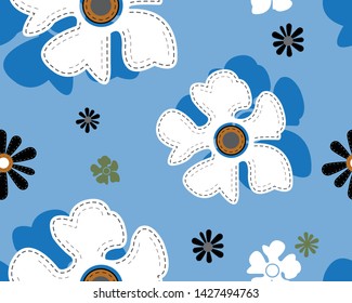 Small flowers on blue background. floral background with bouquets of flowers.