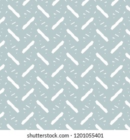 Small fragments and sticks oriented obliquely to the right or left. Simple decorative pattern in white and light blue. Tile. Vector illustration.