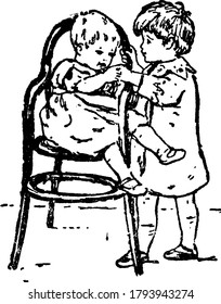 A small girl sitting on her high chair, leaving one of her legs outside the arms of the chair and touching the hands of a small boy standing close by, vintage line drawing or engraving illustration.