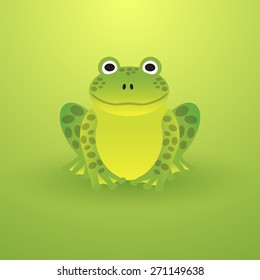 Small green frog on a light background