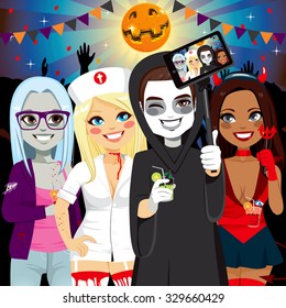 Small group of young adult people on Halloween costume party taking selfie