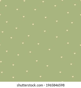 Small  hearts on green background seamless pattern. Cute little hearts in seamless pattern.
Repeated hearts drawn by hand. Cute seamless pattern. Endless romantic print. 