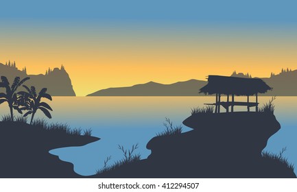 Small hut on the lake at the morning