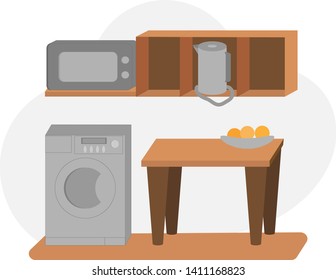 Small kitchen with table, washing machine, microwave oven and kettle