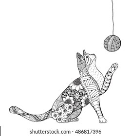 Small  kitten and clew of thread. Cat playing with wool ball. Zentangle stylized cat. Zen art. Ornate. Freehand drawing.