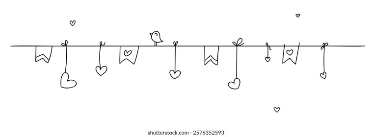 A small lonely bird sits on a garland of hearts. A cute garland of flags and hearts hanging on a thread