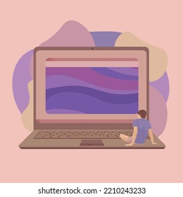 Small man sitting on big laptop on pink background