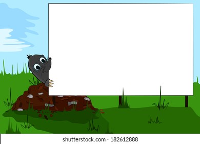 A small mole on the meadow molehill and billboard.