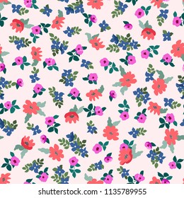 Small naive flowers seamless pattern. Chaotic order. Summer trendy floral background in liberty style. For textile, wallpaper, surface, print, gift wrap, scrapbooking, decoupage