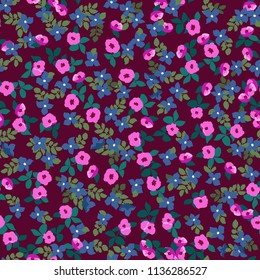 Small naive flowers seamless pattern. Chaotic order. Summer trendy floral background in liberty style. For textile, wallpaper, surface, print, gift wrap, scrapbooking, decoupage