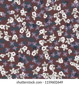 Small naive flowers seamless pattern. Chaotic order. Summer trendy floral background in liberty style. For textile, wallpaper, surface, print, gift wrap, scrapbooking, decoupage. Shabby chic