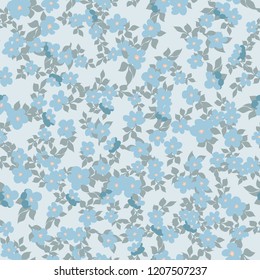 Small naive flowers seamless pattern. Chaotic order. Summer trendy floral background in liberty style. For textile, wallpaper, surface, print, gift wrap, scrapbooking, decoupage