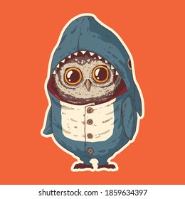 A small owl dressed in pyjamas