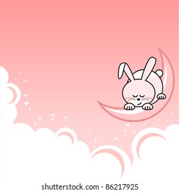 Small pink pretty rabbit sleeping on crescent