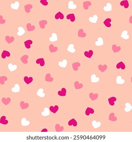 Small pink and white hearts on a pastel peach background, doodle summer,  kids and baby designs for use as fabric or paper.