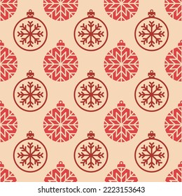 Small red Christmas balls and snowflakes isolated on a beige background. Cute monochrome festive seamless pattern. Vector simple flat graphic illustration. Texture.