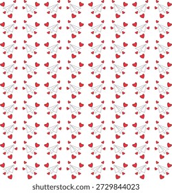 Small red hearts arranged in a repeating pattern on a white surface