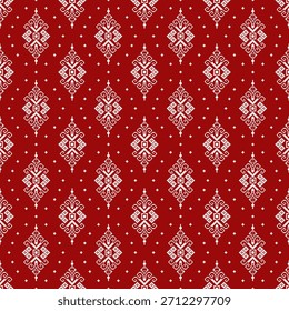 Small red and white textile pattern featuring detailed pixel motif and clear geometric elements.