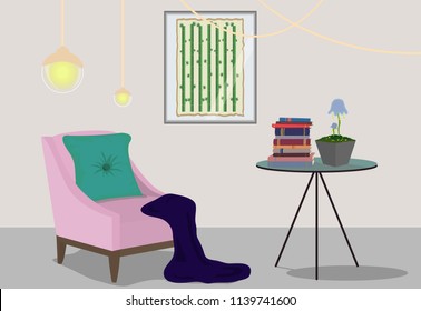 Small room with pink chair, round table and some decor