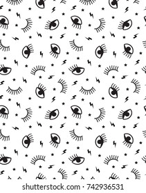 Small seamless pattern with eyes winking, stars and lightning. In black and white.