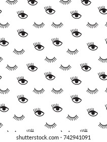 Small seamless patterns with winking eyes in black and white.