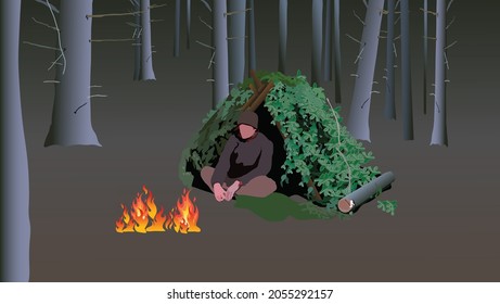 The small shelter is made of a pile of leaves in the middle of the forest and a survivalist sits in it. Alone adventure in wild life