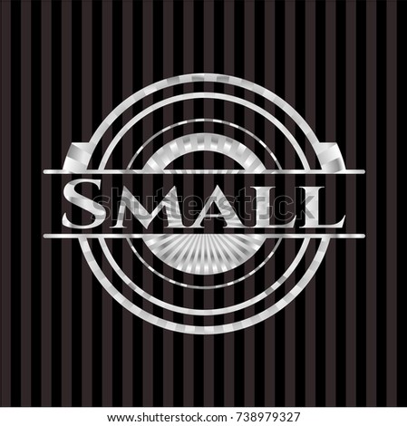 Small silvery badge