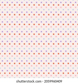 Small stars, multicolored, arranged on a cream background, pattern and background.