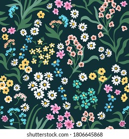 Small summer flowers on black background. Seamless vector pattern. Vintage print with 
 inflorescences. Retro textile collection.