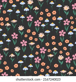 Small summer flowers seamless pattern on a black background. Hand drawn fabric gift wrap wall art design. Vector illustration.