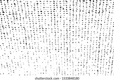 Small uneven spots and particles of debris. Abstract vector texture.  Distressed uneven background. Grunge texture overlay with fine grains isolated on white background. Vector illustration. EPS10.