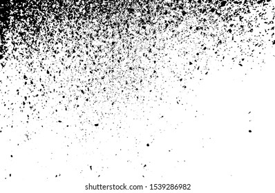 Small uneven spots and particles of debris. Abstract vector texture.  Distressed uneven background. Grunge texture overlay with fine grains isolated on white background. Vector illustration. EPS10.