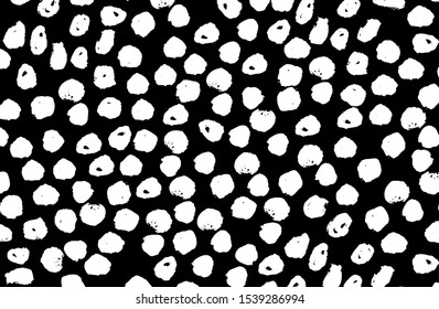 Small uneven spots and particles of debris. Abstract vector texture.  Distressed uneven background. Grunge texture overlay with fine grains isolated on white background. Vector illustration. EPS10.