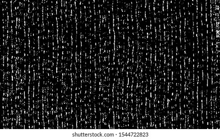 Small uneven spots and particles of debris. Abstract vector texture.  Distressed uneven background. Grunge texture overlay with fine grains isolated on white background. Vector illustration. EPS10.