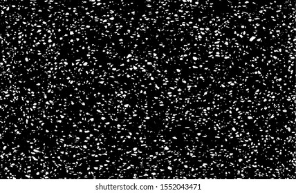 Small uneven spots and particles of debris. Abstract vector texture.  Distressed uneven background. Grunge texture overlay with fine grains isolated on white background. Vector illustration. EPS10.
