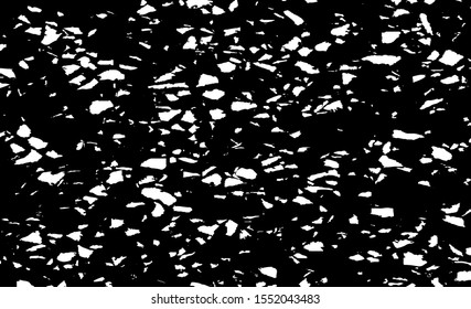 Small uneven spots and particles of debris. Abstract vector texture.  Distressed uneven background. Grunge texture overlay with fine grains isolated on white background. Vector illustration. EPS10.