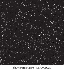 Small uneven spots and particles of debris. Abstract vector texture.  Distressed uneven background. Grunge texture overlay with fine grains isolated on white background. Vector illustration. EPS10.