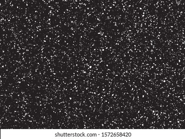Small uneven spots and particles of debris. Abstract vector texture.  Distressed uneven background. Grunge texture overlay with fine grains isolated on white background. Vector illustration. EPS10.